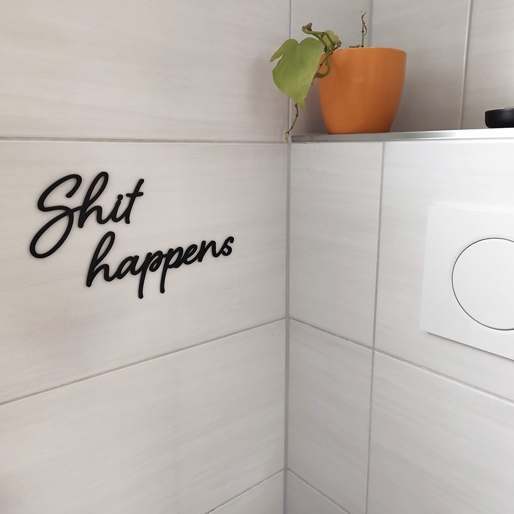 Witziger Spruch Shit Happens für das Badezimmer